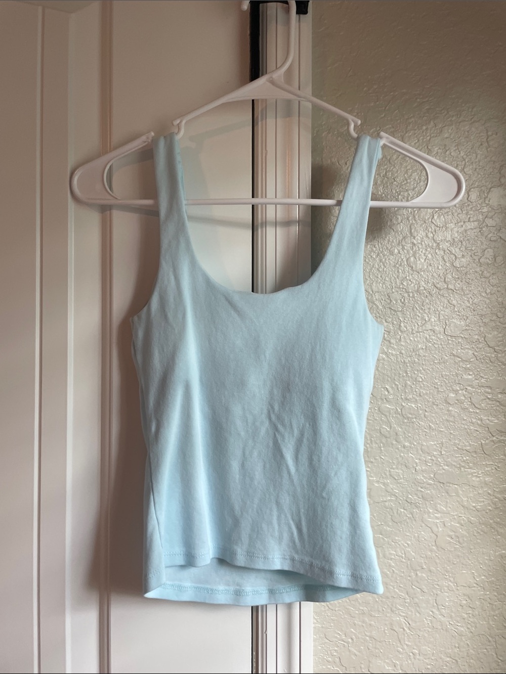 No Boundaries Light Blue Tank Top with Pink Flower Accent - Picture 2 of 2